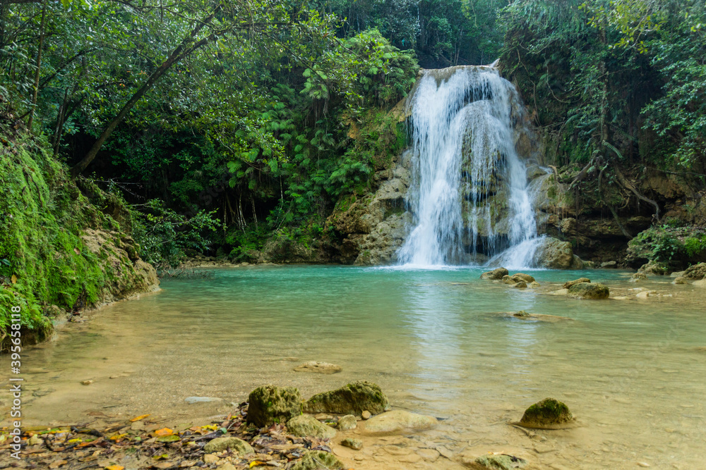 Small waterfall of El Limon cascade, Dominican Republic - obrazy, fototapety, plakaty 
