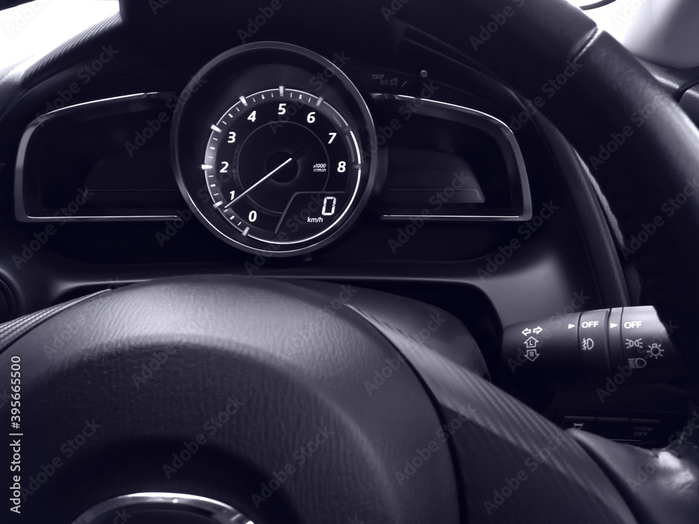 Interior view of car speedometer with steering wheel. Interior view of car speedometer with steering wheel.