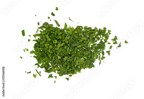 Fresh chopped celery leaves isolated on white. Aromatic Spice celery leaves.
