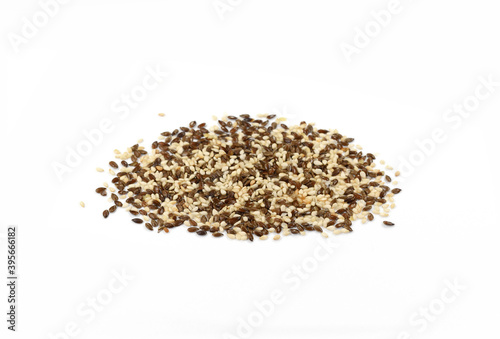 sesame and Organic Linseed or Flaxseed (Linum usitatissimum) isolated on white background.