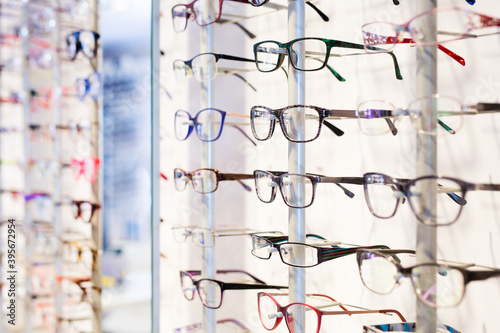 Foto Image of glasses showcase at modern optic shop, nobody