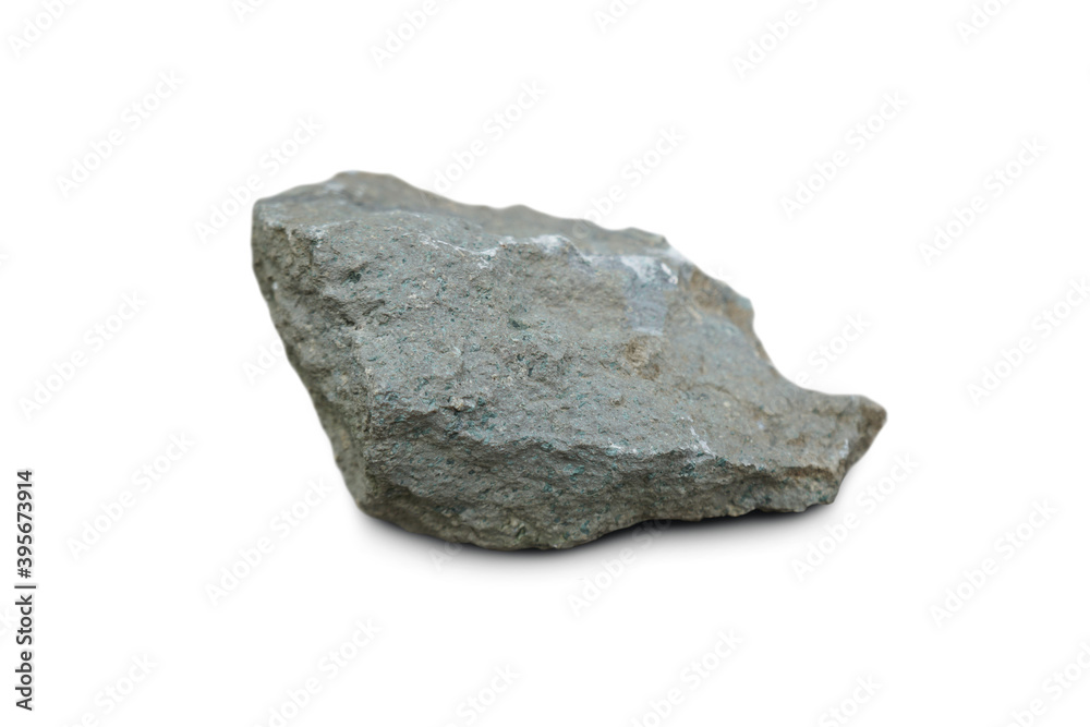A piece of Andesite rock isolated on white background, Andesite is an extrusive volcanic rock of intermediate composition.