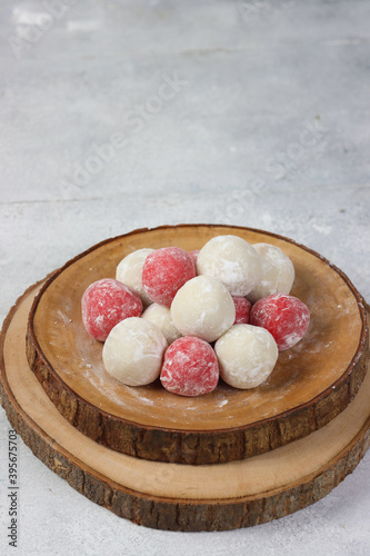 Moci merah putih. Red and White Mochi or moci cake. One of traditional snack from Indonesia. Made from glutinous rice flour with sugar and roasted peanut filling. photo