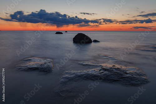 Late summer sunset on shore of the Baltic Sea , rocky coast. Estonia.