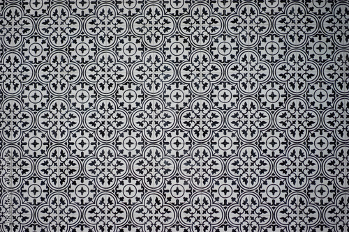 Square ceramic tiles in black and white patterns. Mosaic wall or flooring tiles.