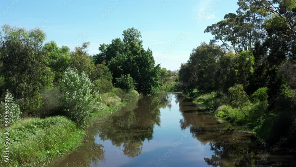 AERIAL Over Calm Reflective Australian River Bathed In Sunshine AERIAL Over Calm Reflective Australian River Bathed In Sunshine