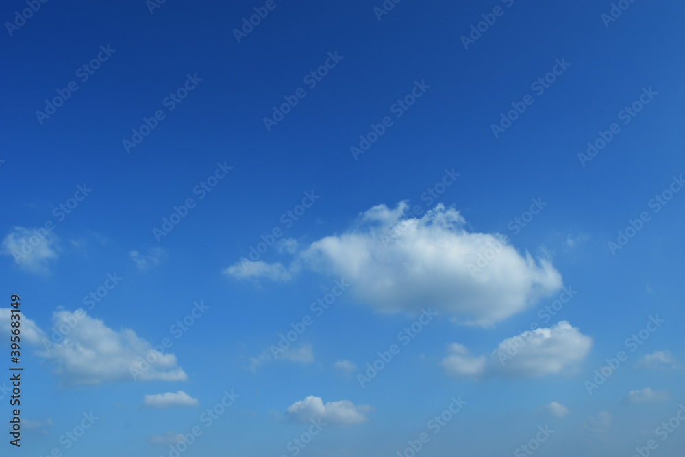 Cumulus cloud on beautiful blue sky in day light , Fluffy clouds formations at tropical zone Cumulus cloud on beautiful blue sky in day light , Fluffy clouds formations at tropical zone