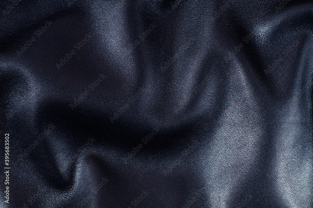 Fototapeta premium Leather texture, black background, wallpaper, horizontal, no people, top view,