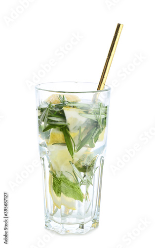 Glass of cold mojito with lime on white background
