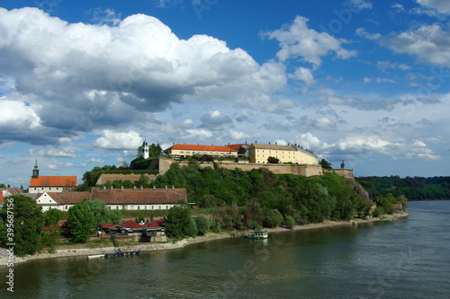 panoramic view of the Petrovaradin Fortress with blue sky and white clouds in the background