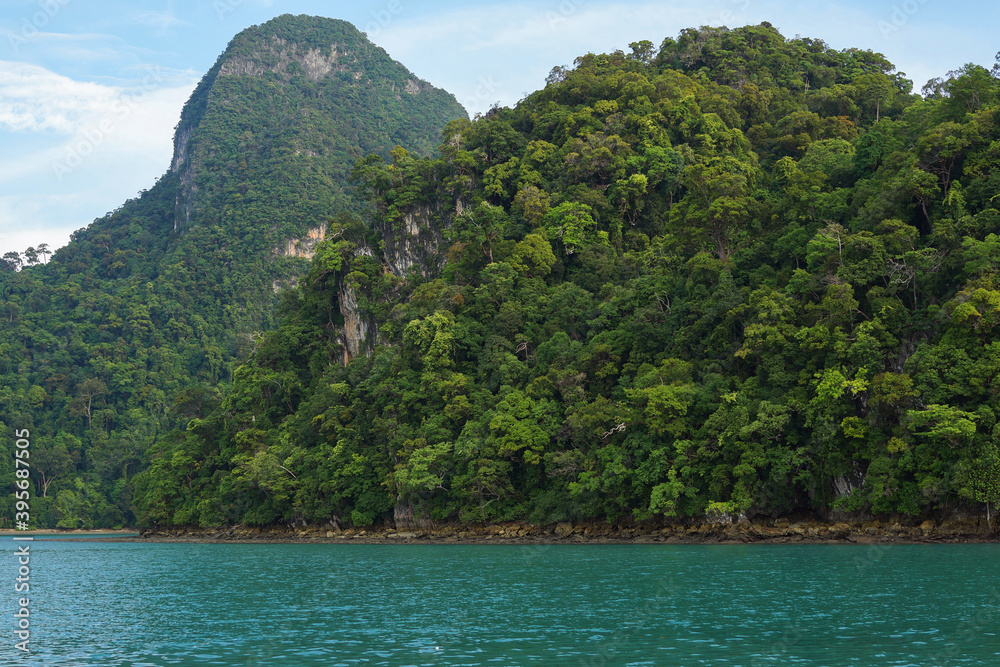 Langkawi islands surrounded by pristine waters and lush rainforest.