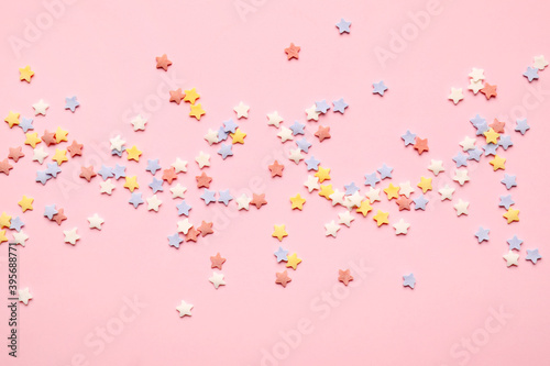 Sweet sprinkles on color background