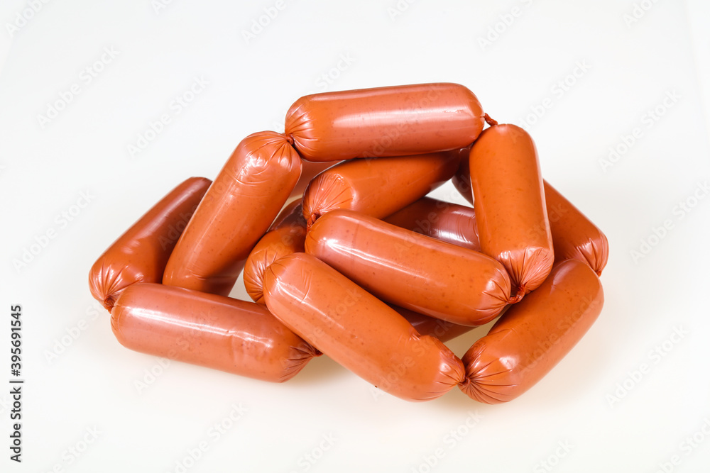 Tasty meat sausages over white background Tasty meat sausages over white background