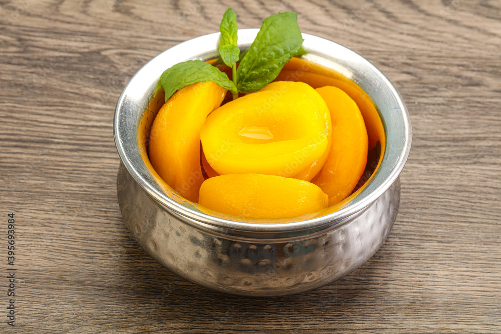 Sweet ripe canned peaches with mint Sweet ripe canned peaches with mint