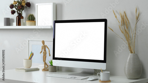 White concept home office room with computer, supplies and decorations on the table © bongkarn