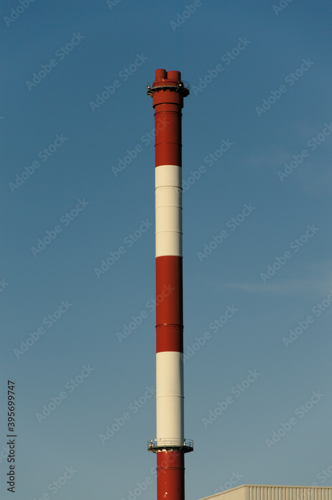 Industrial chimney against the background of blue sky. Bytom Silesia Poland Industrial chimney against the background of blue sky. Bytom Silesia Poland