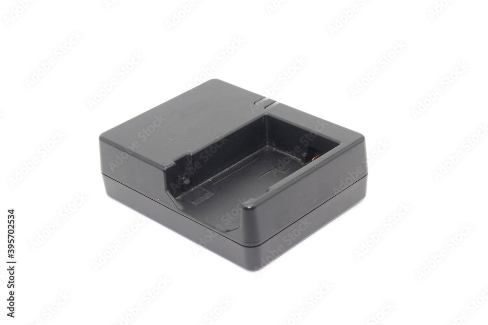 DSLR camera battery charger on white background DSLR camera battery charger on white background