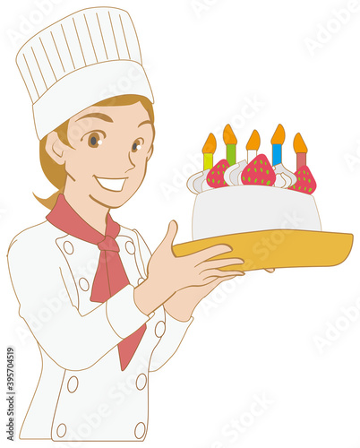 誕生日ケーキを持つパティシエの女性