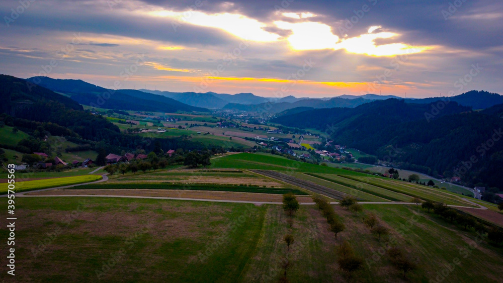 Naklejka premium sunset in the mountains