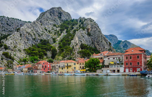 View of the embankment of the Cetina River and the mountains in the town of Omis. © a_mikhail