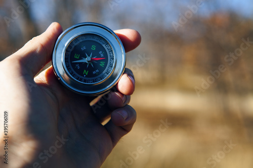 compass in the hands of a man