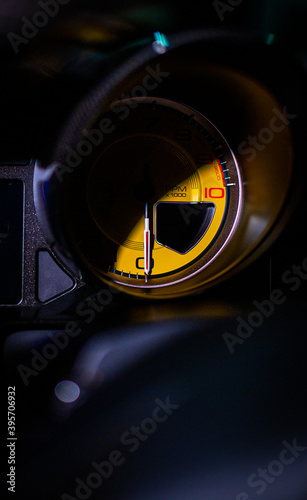 yellow tachometer close up 