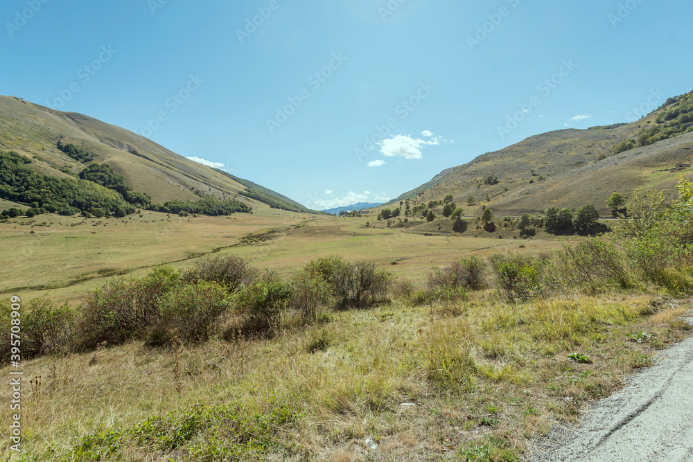 Fototapeta premium meadows and green slopes at Godi pass, Abruzzo, Italy