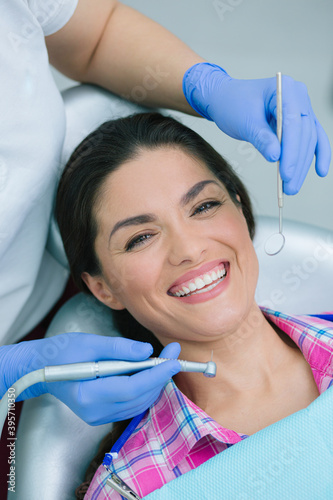 Mirthful patient looking not afraid of dental treatment photo