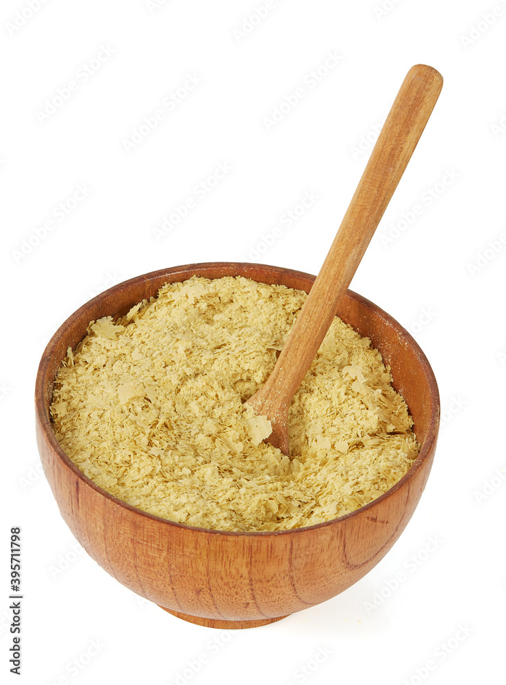nutritional yeast flakes isolated on white background nutritional yeast flakes isolated on white background
