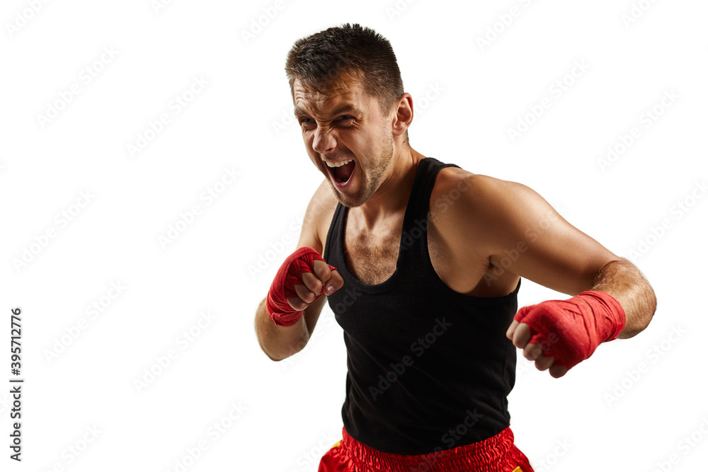 sporty man in red sports bandages on his hands fighting isolated on white background sporty man in red sports bandages on his hands fighting isolated on white background
