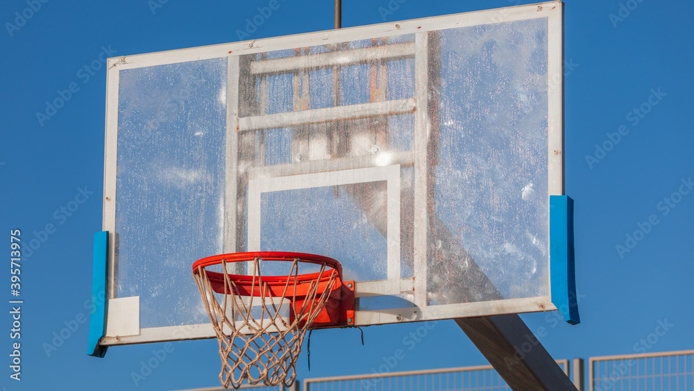 Close-up view on the transparent basketball board in dew