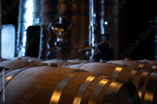 barricas de madera de roble en bodega photo