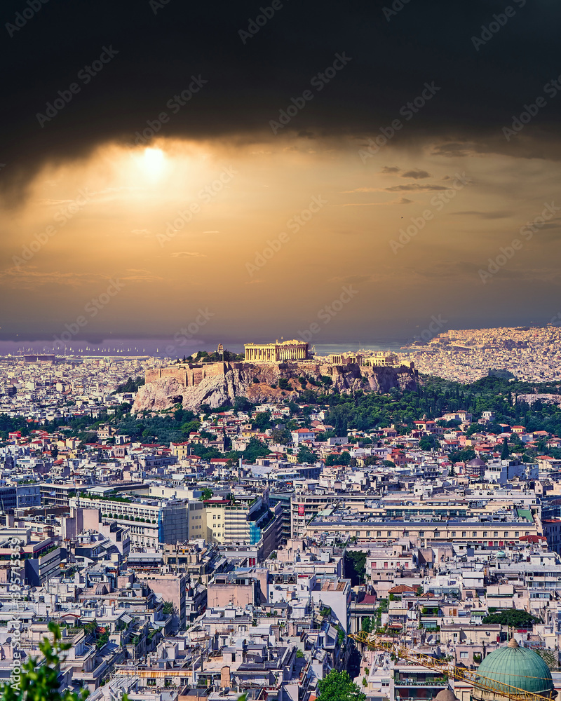 Acropolis and Athens urban area panoramic view under dramatic sky, Greece