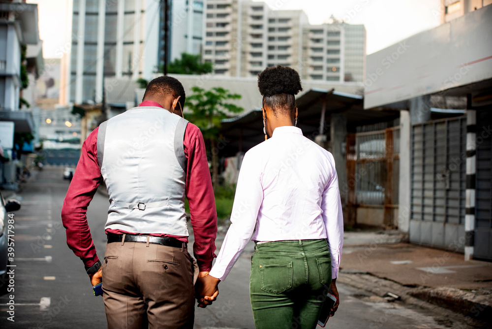 beautiful young couple walking on the street beautiful young couple walking on the street