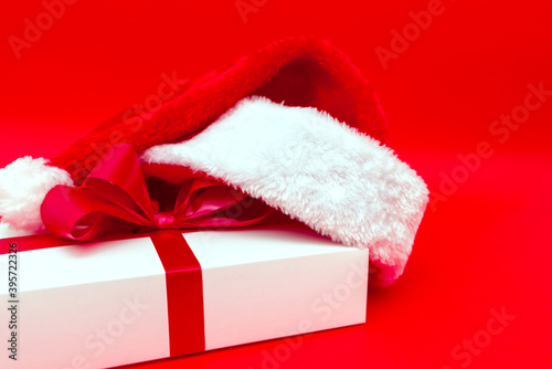 Christmas white present with santa hat closeup © ARVD73