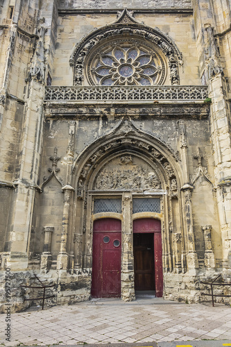 Built in heart of Fecamp XVI century Saint-Etienne church dominates now wearing Norman city  Renaissance portal  flamboyant Gothic steeple. Fecamp  Seine-Maritime department  Haute-Normandie  France.