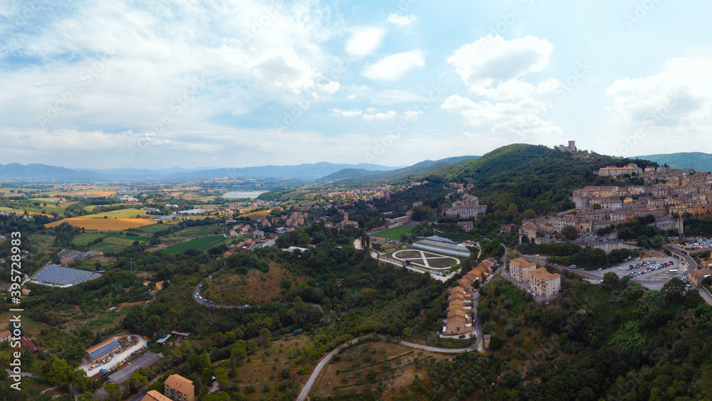 Panoramic aerial view of Narni (Terni, Umbria, Italy), medieval city with a rich history. Industrial part of the city. Incredible views. Summer day. Europe travel and vacation concept