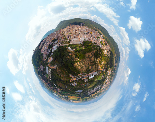 Panoramic aerial little planet view of Narni (Terni, Umbria, Italy), medieval city. Houses made of stone on top of the mountain. Incredible views. Europe travel and vacation concept