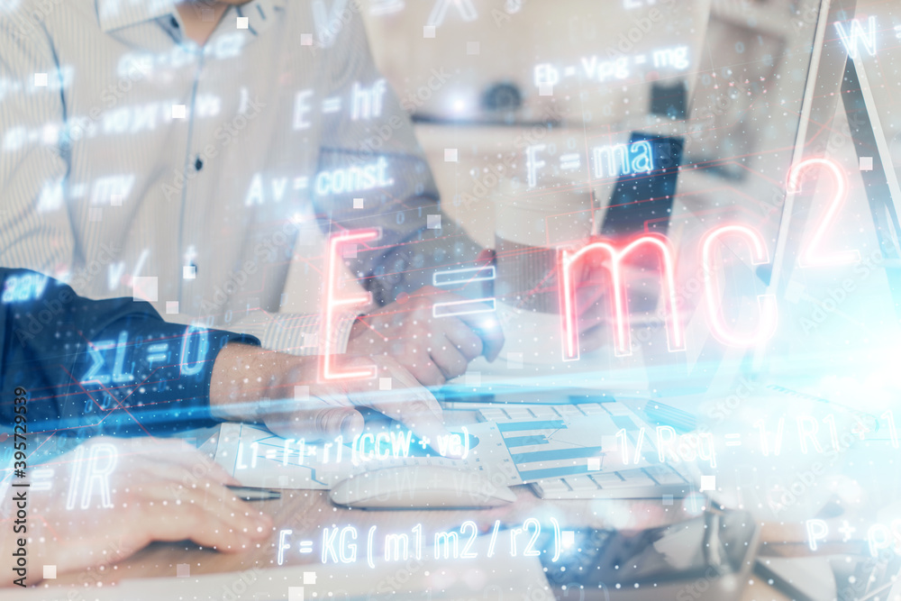 Science formula hologram with man working on computer on background. Education concept. Double exposure. Science formula hologram with man working on computer on background. Education concept. Double exposure.