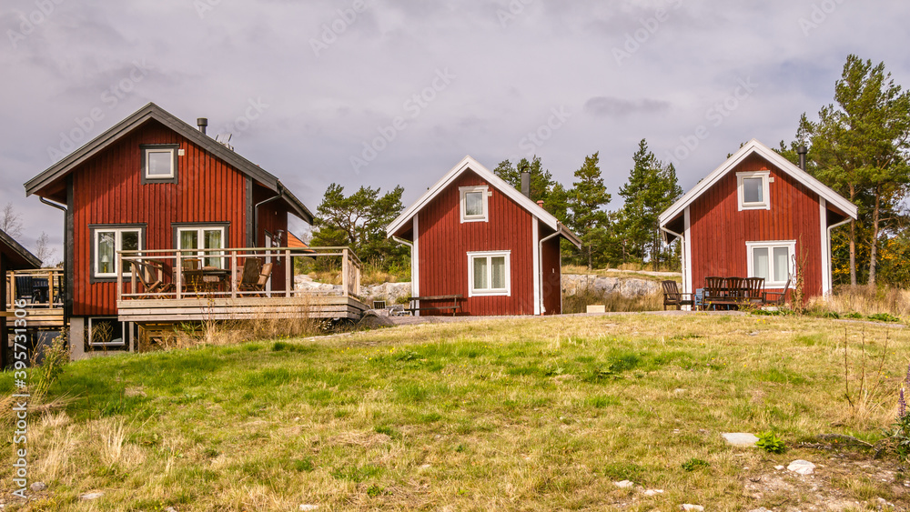 Traditional red wooden holiday homes in Sweden Europe