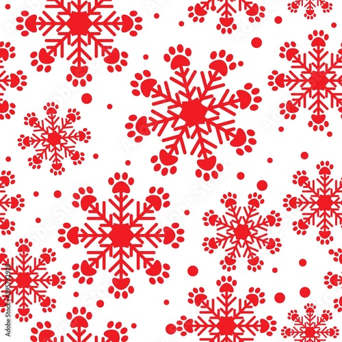 Christmas snowflakes with paw prints seamless vector pattern