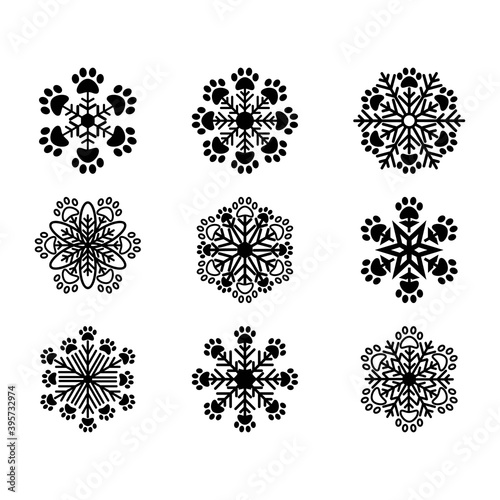 Christmas snowflakes with paw prints vector illustration