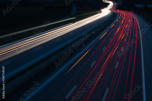 Highway trafic at night. Car lights in the highway with long exposure