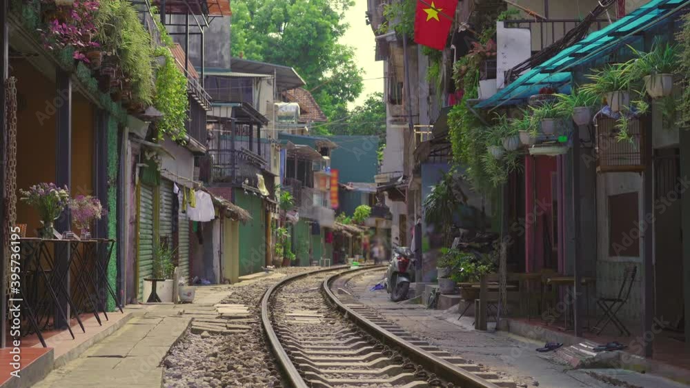 The railway which goes through a residential area in Hanoi city. Hanoi Train Street is a famous tourist destination