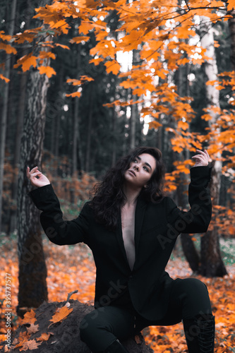 beautiful girl in the autumn forest