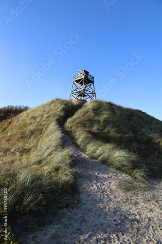 Vertical shot of a metal observation point in the Blavandshuk coast in Jutland, Denmark photo