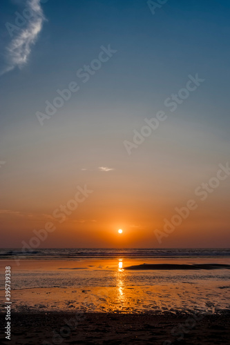 Sunset on beach of Atlantic Ocean
