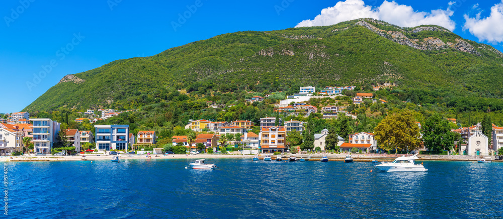 Yacts and houses in the Kotor bay on the shore of the Adriatic sea, Kotor Bay, Montenegro
