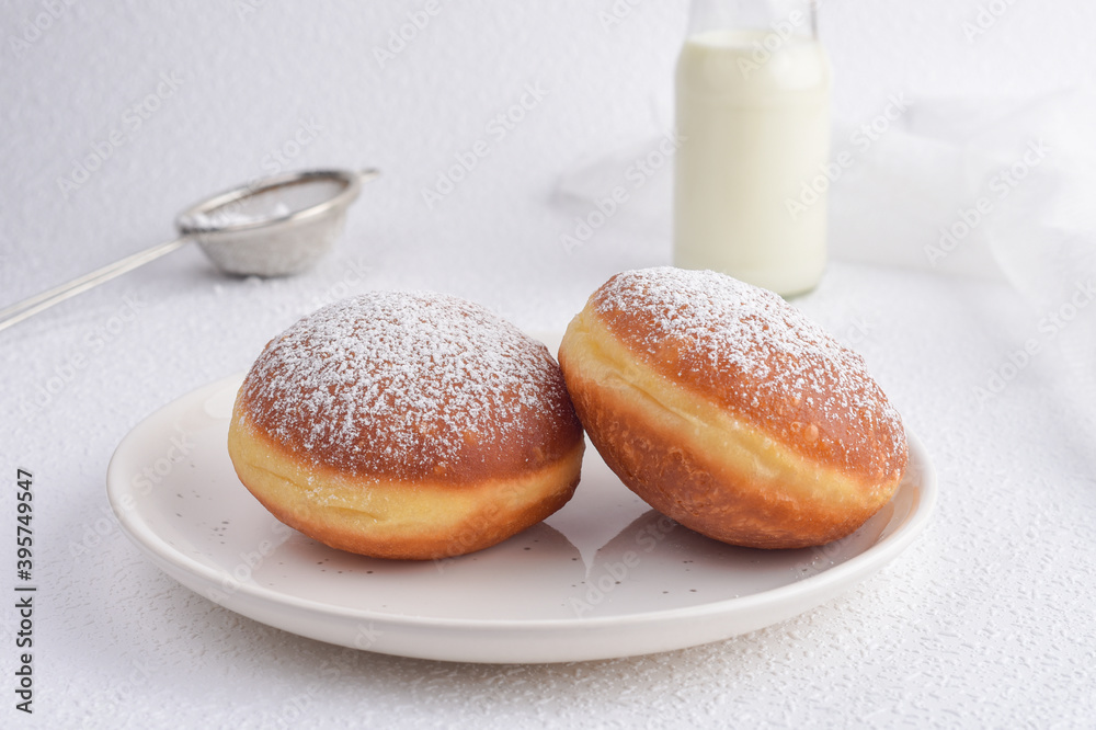 Viennese jelly donuts with apricot jam and milk