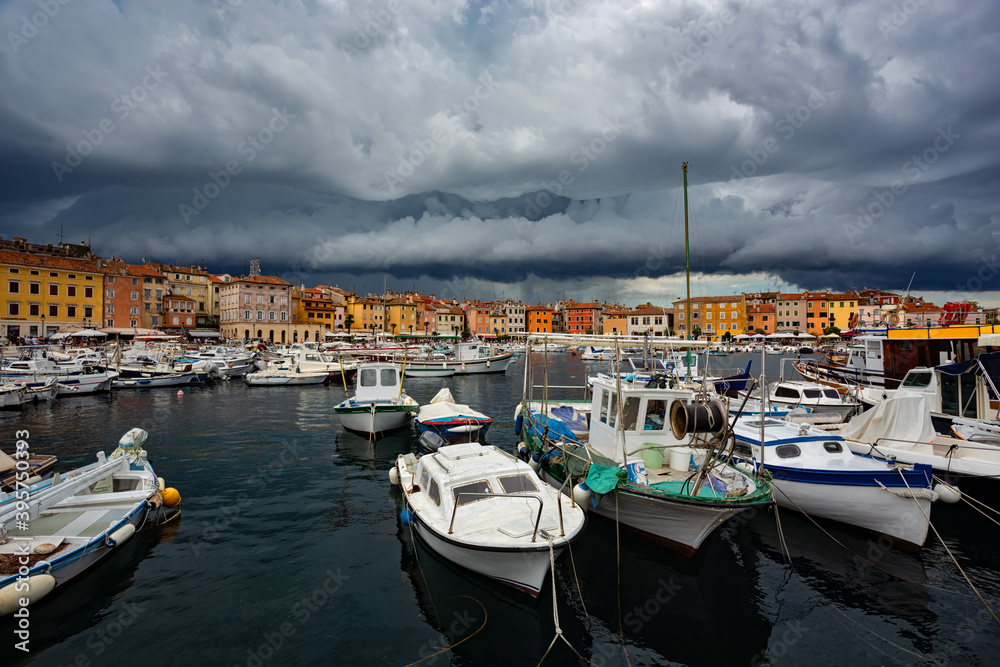 storm clouds over marina in Rovinj, Croatia.
